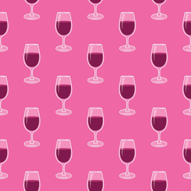 Vector seamless pattern of a glass of wine on a pink background.